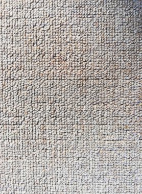 Synthetic carpet background in grey color