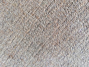 Synthetic carpet background in grey color
