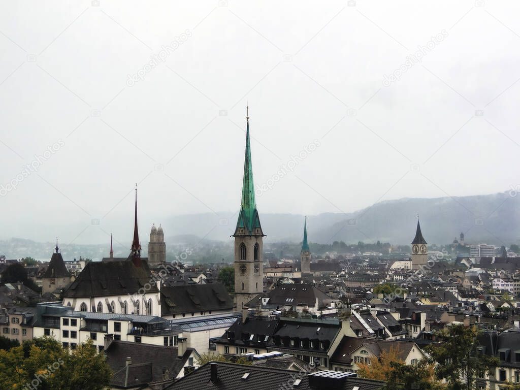 Panorama of the historic center of Zurich in cloudy weather - Gothic and cloudy sky