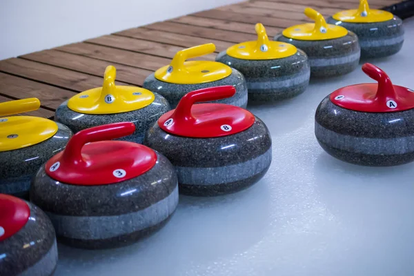 Curling Stones Red Yellow Handles Ice Stones Ready Play — Stock Photo, Image