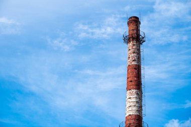 The top of an old water tower against a sky with clouds in Sloka, Jurmala, Latvia.