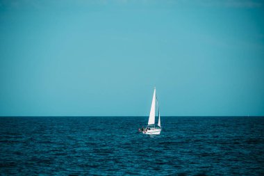 Spain, Barcelona - May 29 2022: View of the Balearic Sea with small yachts and a beautiful sky in Barcelona.