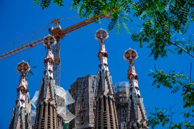 Barcelona, Spain - May 28 2022: In the frame is the famous Sagrada Familia basilica during construction.