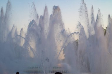 Day Photograph Before Sunset Of The Performance Of The Singing Magic Fountain Of Montjuic In Barcelona, Catalonia, Spain.