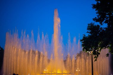 Night Photograph Of The Performance Of The Singing Magic Fountain Of Montjuic In Barcelona, Catalonia, Spain.