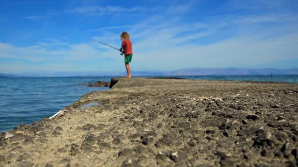 Blurred Timelapse Young Boy Fishing Pier Ionian Sea Moraitika Greece — Stock Video