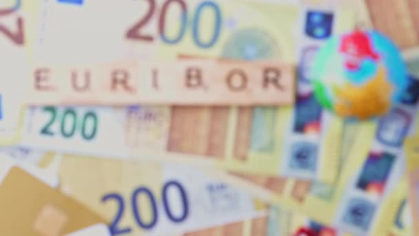 Ord Euribor Träbokstäver Bakgrund 200 Eurosedlar Glob Och Bankkort Den — Stockvideo