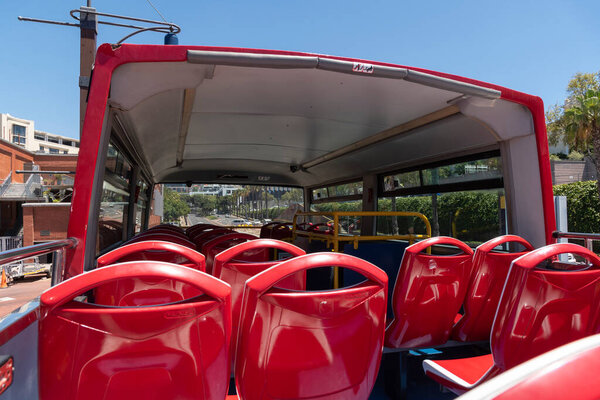 Cape Town, South Africa. 2022. Red seating on the upper deck of city tour bus in Cape Town.
