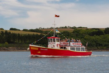 Falmouth, Cornwall, England, UK. 2022. Tourist trip boat off the Cornish coast inbound to Falmouth with passengers onboard. Cornwall, UK