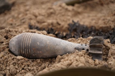 Demining by troops of the territory. Many mines, shells, artillery, grenades, fragmentation grenades