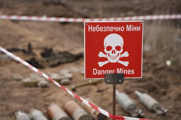 Demining by troops of the territory. Many mines, shells, artillery, grenades, fragmentation grenades