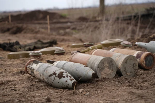 Demining by troops of the territory. Many mines, shells, artillery, grenades, fragmentation grenades