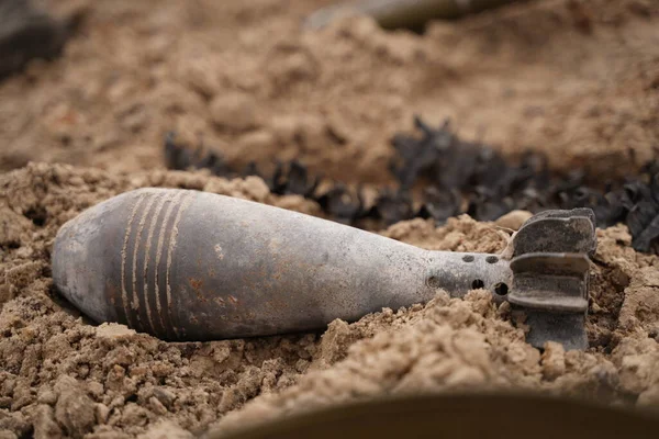 Demining by troops of the territory. Many mines, shells, artillery, grenades, fragmentation grenades