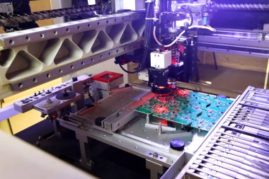 Installer of SMD parts on boards and soldering parts. Machine for automatic assembly and soldering of electronic circuit boards. Electrical soldering parts. Automated device assembly machine. Computers and electronics