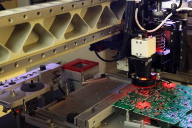 Installer of SMD parts on boards and soldering parts. Machine for automatic assembly and soldering of electronic circuit boards. Electrical soldering parts. Automated device assembly machine. Computers and electronics.