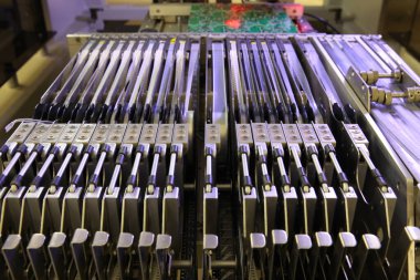 Installer of SMD parts on boards and soldering parts. Machine for automatic assembly and soldering of electronic circuit boards. Electrical soldering parts. Automated device assembly machine. Computers and electronics.