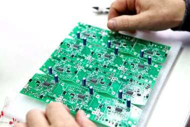 Electrical boards with parts for manual assembly of an electrical device. Digital indication. Manual assembly of radio components..
