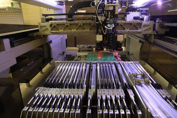 Installer of SMD parts on boards and soldering parts. Machine for automatic assembly and soldering of electronic circuit boards. Electrical soldering parts. Automated device assembly machine. Computers and electronics.