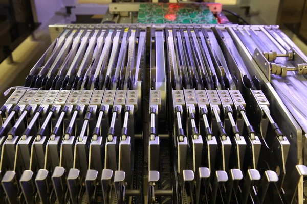 Installer of SMD parts on boards and soldering parts. Machine for automatic assembly and soldering of electronic circuit boards. Electrical soldering parts. Automated device assembly machine. Computers and electronics.