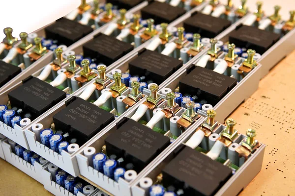 Assembly of electronic components for voltage relays. Manual assembly of electronic components for home electrical systems...