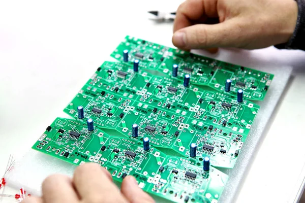 Electrical boards with parts for manual assembly of an electrical device. Digital indication. Manual assembly of radio components..