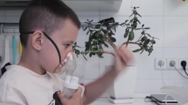 Boy Breathing Inhaler Home — Stockvideo