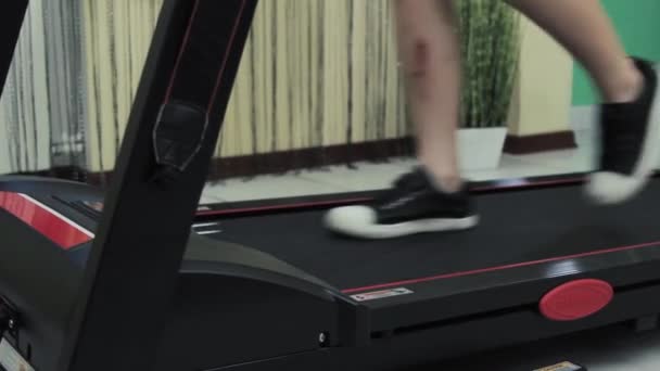 Male Legs Treadmill Doing Sports Home — Stockvideo