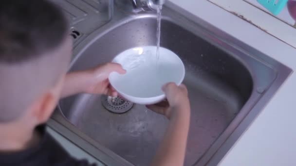 Young Guy Washes Dishes Sink Kitchen White Plate Frame Close — Wideo stockowe