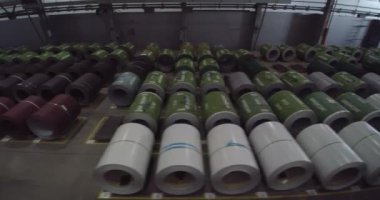 Warehouse of metal blanks, metal sheet in large rolls for the production of galvanized metal products. Ukraine, Kyiv - January 2021