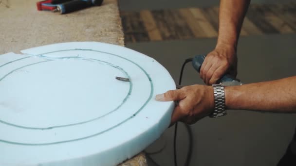 Close Hand Male Worker Cutting Foam Rubber Production Sofa Furniture — Vídeo de Stock