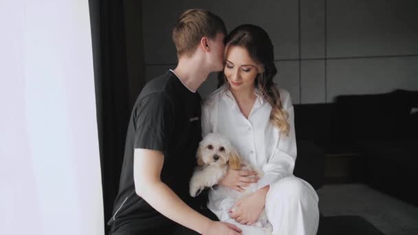 Attractive Couple Dog Sitting Each Other Floor Smiling Kissing Couple — Stock Video