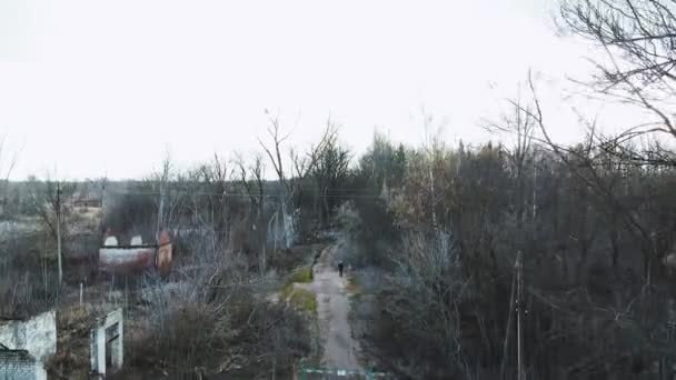 ゴーストシティチェルノブイリ地域の空中ビュー 死んだ都市 空の道路 冬時間 震災から35年 黙示録的な街だ スローモーション 高品質4K映像 — ストック動画