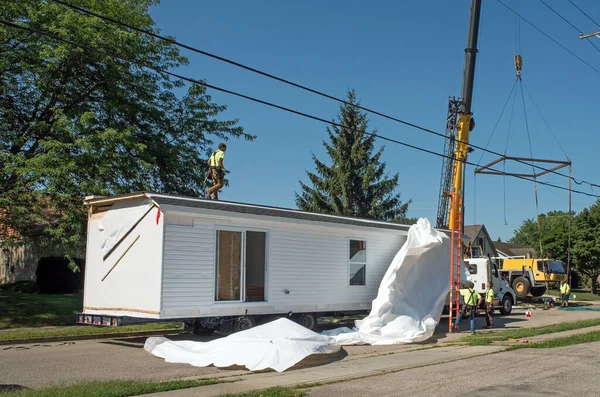 Modular Home Covering Being Removed — 스톡 사진