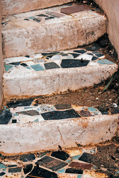 Old stairs with tiles, close-up