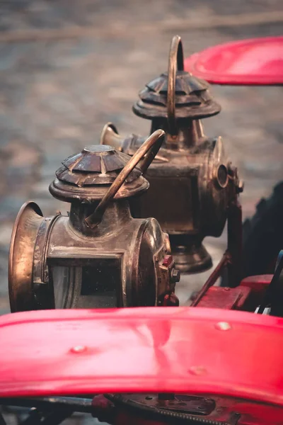 close-up view of vintage car flashlights