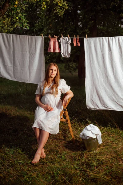 Pregnant Girl White Dress Hangs Children Underwear Garden — Stock Photo, Image