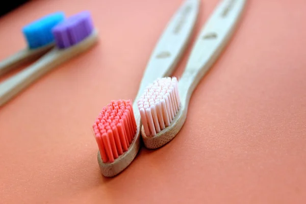 Bamboo toothbrushes in glass. Zero waste concept. Eco-friendly accessories. — Stock Photo, Image