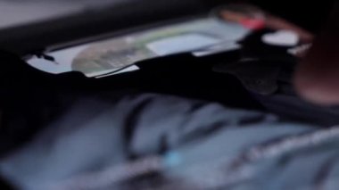 BILTEN - JANUARY 4, 2022, User opens App Tiktok and scrolling through feed