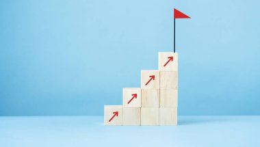 Business growth success process concept, Ladder career path for business.Wood block stacking as step stair with arrow up and flag