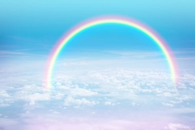 Beautiful rainbow and colorful sky with cloud fantasy in summer day.