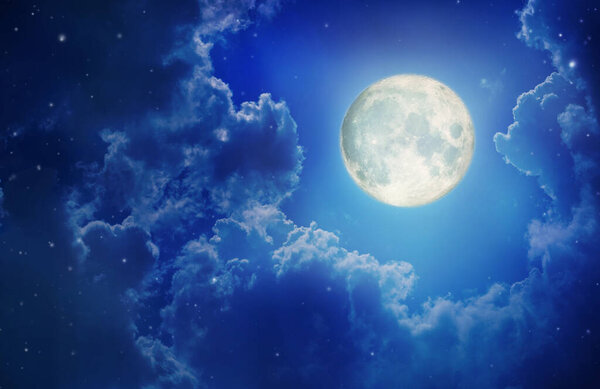 Full moon in night sky with the clouds ,Elements of this image furnished by NASA.