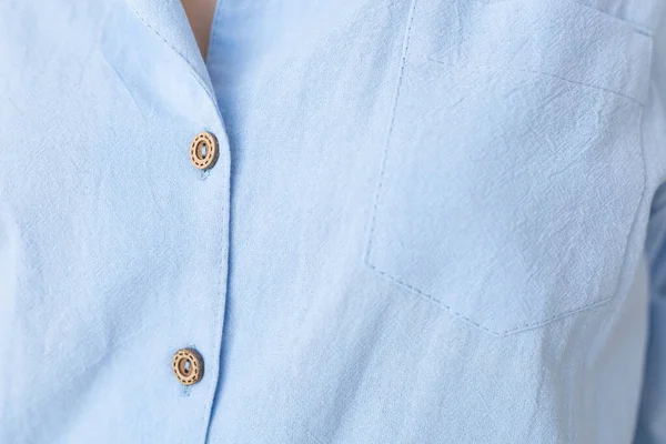 Close-up detail en stof textuur van een pyjama. Huishoud-, slaap-, winkel- en verkoopconcept — Stockfoto