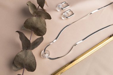 Handmade jewelry on a textile background. Gift for women. Bijouterie and jewellery for women