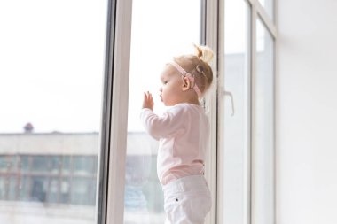 Cochlear implant for baby. Deaf child with hearing aid. Health care and medicine technology and innovations