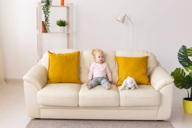 Cochlear implant for baby. Deaf child with hearing aid. Health care and medicine technology and innovations