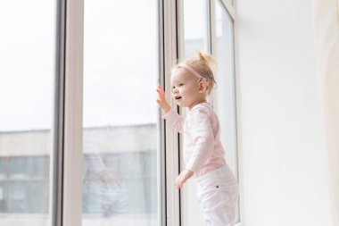 Cochlear implant for baby. Deaf child with hearing aid. Health care and medicine technology and innovations and diversity , copy space and place for advertising