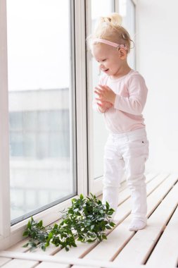 Cochlear implant for baby. Deaf child with hearing aid. Health care and medicine technology and innovations and diversity