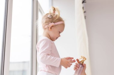 Cochlear implant for baby. Deaf child with hearing aid. Health care and medicine technology and innovations and diversity