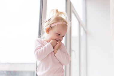 Cochlear implant for baby. Deaf child with hearing aid. Health care and medicine technology and innovations and diversity - copy space and place for advertising