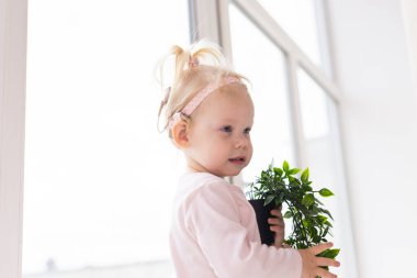 Cochlear implant for baby. Deaf child with hearing aid. Health care and medicine technology and innovations